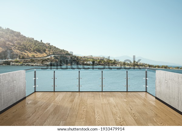 View from the balcony to the sea.Landscape. Sunny\
Day. Terrace with a beautiful view. Background with beautiful\
landscape. City near the\
sea.