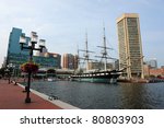 View of Baltimore Harbor with USS Constellation Ship and office buildings