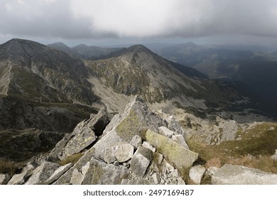 View from Banikov, Rohace, Western Tatras, Slovakia. Top, peak and summit of rocky mountains. Cloudy overcast weather clouds and very soft light. - Powered by Shutterstock