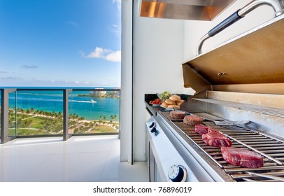 View of a barbecue in an luxury terrace with ocean view.