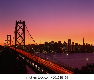 View Of Bay Bridge From Treasure Island At Sunset, San Francisco, California