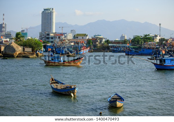 View of Bay with fishing boats in Nha Trang river\
Kai, Vietnam