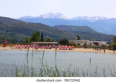 view of the beach with the background of a mountain.