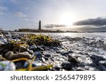 view from the beach to Laboe Naval Memorial, Germany at sunset