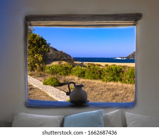 View Of Beach In Mykonos Through Window