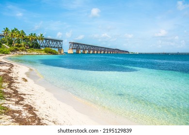The view from the beach on the broken railroad bridge in Key West, Florida