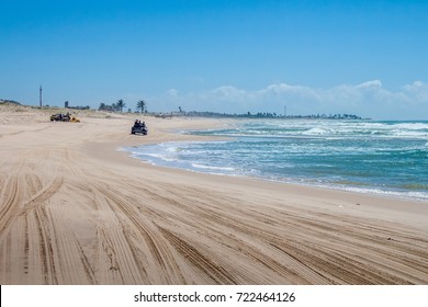 View of Beach with rally cars in Natal Brazil