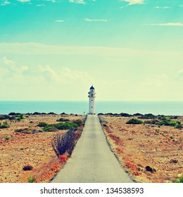 View of beacon Far de Barbaria in Formentera, Balearic Islands, Spain, with a retro effect