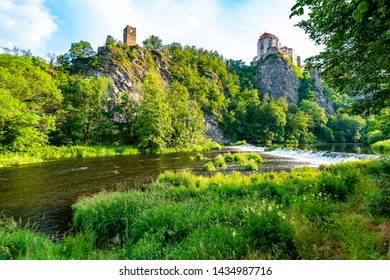 View of beautiful castle Vranov nad Dyji, Moravian region in Czech republic. Ancient chateau built in baroque style, placed on big rock above river near the Vranov village. Cloudy weather