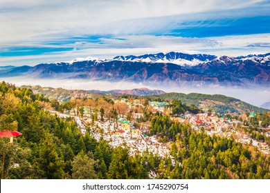 View of beautiful homes in town and snow covered Pir Panjal range (Inner Himalayan region) at Dalhousie, Himachal Pradesh, India. - Shutterstock ID 1745290754