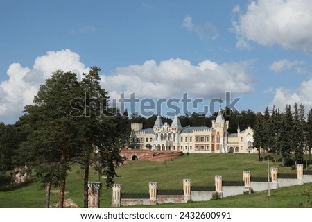 View of a beautiful palace against a background of blue sky in a pine forest in the village of Kiritsy, Spassky district, Ryazan region