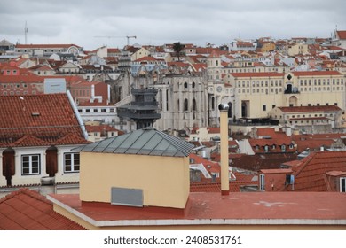 View of the beautiful skyline of Lisbon, Portugal, with red-roofed, colorful houses in the Alfama district - Lisbon cityscape showcasing its historic charm and vibrant atmosphere Streets of Lisbon