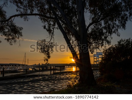 View of a beautiful sunset in background of Mare Island in Vallejo, Ca. , Solano county seen from the marina