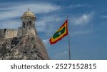 View of the beautiful waving flag of Colombia and Cartagena 