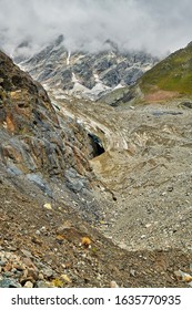 View of the beginning of the Shkhara glacier. From the left, a deep glacier crack, bergschrund is visible. The beginning of the storm. One-day tracking from Ushguli August 2019.