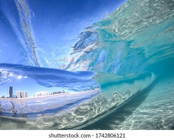 The view from behind a crystal clear wave