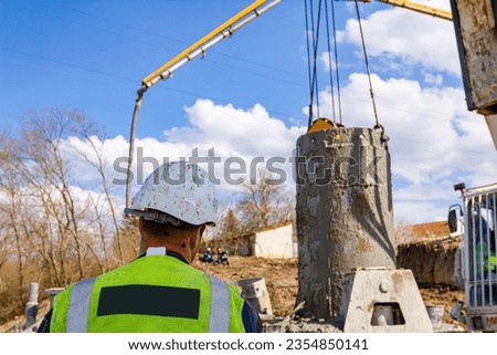 Similar – Image, Stock Photo Engineer managing cables behind solar panels at a solar farm. Alternative energy ecological concept image.