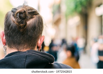 View From Behind Of Young Man With Beard, Long Hair And Hair Bun