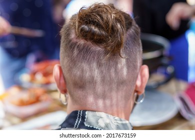 View From Behind Of Young Man With Beard, Long Hair And Hair Bun