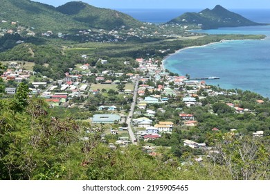 View from Belair, Carriacou, one of the islands off the coast of Grenada. In this photo the town of Hillsborough and the ocean can be seen.