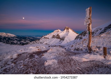 View Of The Belianske Tatras From Vyšné Kopské Sedlo During Sunrise In Winter With Tourist Sign On Wooden Column. Tatry, Slovakia