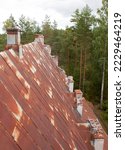 View from the bell tower to the roof of the church and the surrounding landscape. Abandoned Finnish church. The village of Lumivaara. Lahdenpohsky district. Republic of Karelia. Russia