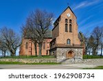 View of the bell towers in the vicinity of the Catholic church of St. Achacjusz in the village of Czernice Borowe in Masovia in Poland.