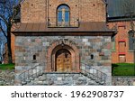 View of the bell towers in the vicinity of the Catholic church of St. Achacjusz in the village of Czernice Borowe in Masovia in Poland.