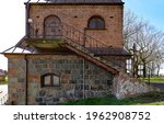 View of the bell towers in the vicinity of the Catholic church of St. Achacjusz in the village of Czernice Borowe in Masovia in Poland.