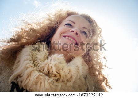 Similar – Image, Stock Photo Frog perspective | View into the bare treetops in the forest.