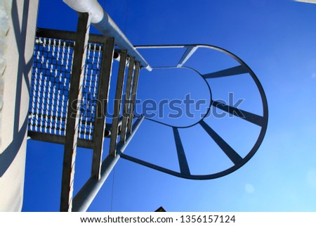 Similar – Basketball hoop from the frog’s perspective in front of a blue sky