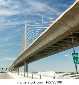 A view from below the Veterans' Glass City Skyway, or the Toledo Skyway Bridge, a cable-stayed bridge on Interstate 280 in Toledo, Ohio. - Shutterstock ID 165723398