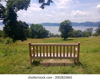 View Of A Bench Overlooking The Hudson River At  New York