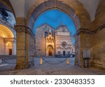 View of Bergamo Cathedral through the arch at dusk in Bergamo, Italy