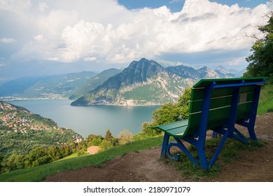 View from "Big Bench" to Lake Iseo and Mount Corna Trentapassi at sunny day with clouds. Fonteno, Bergamo, Lombardy, Italy. - Shutterstock ID 2180971079