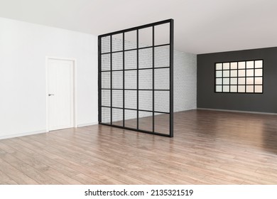 View Of Big Empty Room With Black Folding Screen And Window