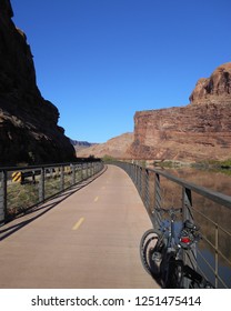 View Of Bikes And Road Near Colorado River In Moab, Utah.         