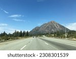 View of Black Butte, Mount Shasta, driving northbound on Interstate 5  near Weed, Siskiyou County, California, USA