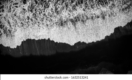 view of black sand beach atlantic ocean waves in Iceland - Powered by Shutterstock