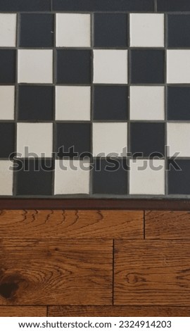 View of black and white tiled geometric chequered Victorian floor