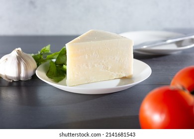 A View Of A Block Of Parmigiano Reggiano Cheese.