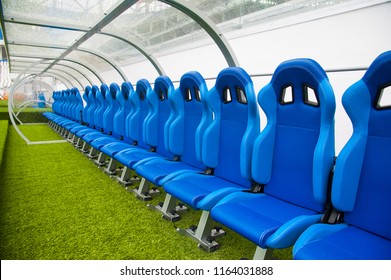 View of blue bench or seat or chair of staff coach in the stadium of football - Powered by Shutterstock