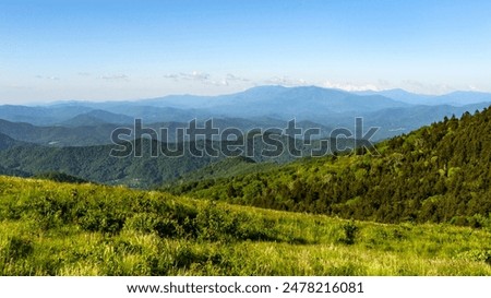 Similar – Image, Stock Photo Scenic landscape of mountains under night sky with stars