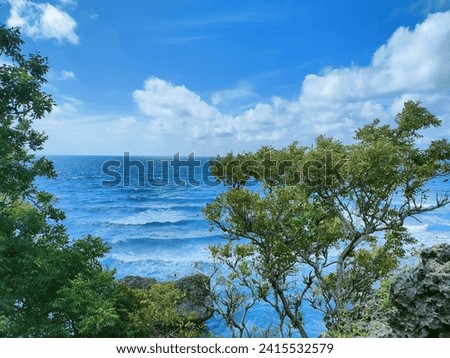 Similar – Sea waves breaking against cliff