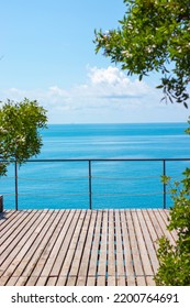 View Of The Blue Sea From The Wooden Veranda