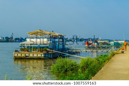 view of a boat moored at shore of Danube in Ruse, Bulgaria.
