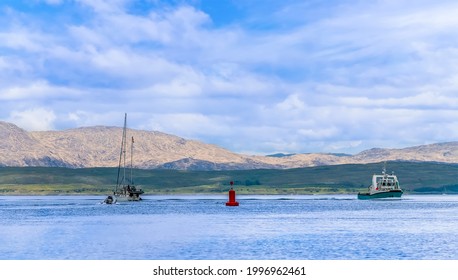 A View Of  Boats In The Firth Of Lorn Near To Oban, Scotland On A Summers Day