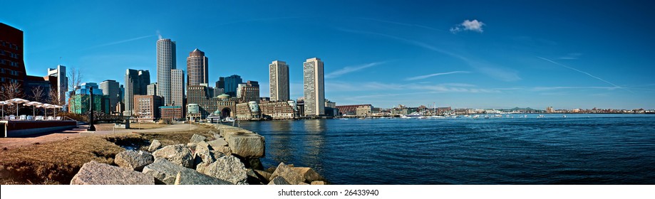 view of boston harbor and rowes wharf and skyscraper buildings in boston massachusetts