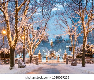 View Of Boston In Massachusetts, USA In The Winter Season At Commonwealth Avenue With Snow And Christmas Lights.