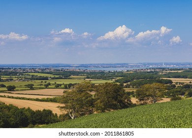 The View From Brading Down, Isle Of Wight With The Town Of Ryde To The Left And The City Of Portsmouth Across The Solent To The Right.